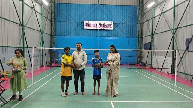 Young winners with trophies